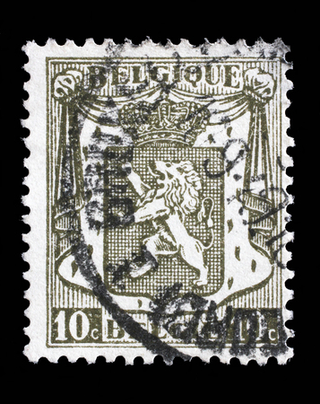 Stamp printed in Belgium shows Belgian coat of arms, circa 1912のeditorial素材