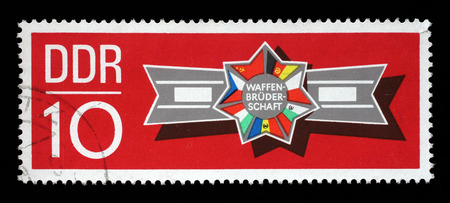 Stamp printed in GDR shows the flags of the countries of the Warsaw Pact, circa 1970のeditorial素材