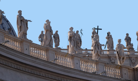 Gallery of saints, fragment of colonnade of St. Peters Basilica. Papal Basilica of St. Peter in Vatican - the world largest church, is the center of Christianity in Rome, Italyの写真素材