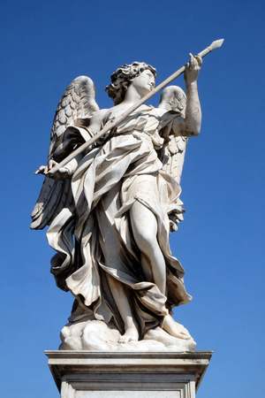 Statue of Angel with the Lance by Domenico Guidi, Ponte Sant Angelo in Rome, Italyの写真素材