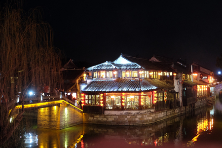 Night scenes of Chinese water village Xitang. It is one of six destination ancient Town, located in Zhejiang Province, Chinaのeditorial素材