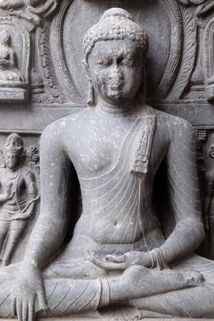 Buddha in Bhumisparsha, from 10 -11th century found in Bihar now exposed in the Indian Museum in Kolkata, West Bengal, Indiaのeditorial素材