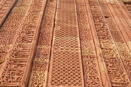 Stone carving on Qutab Minar, Delhi, Indiaの写真素材