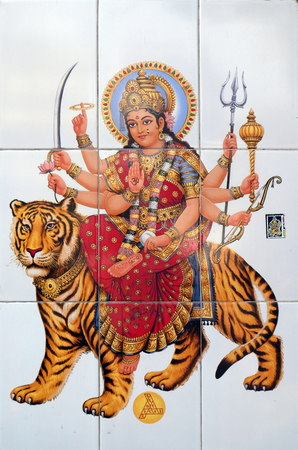 Colorful illustration of Hindu goddess Durga on the wall in Kolkata, Indiaのeditorial素材