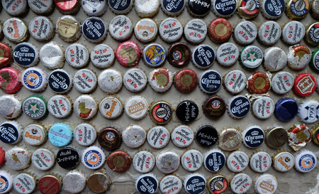 Beer bottle caps collection. Beer sales in China rose 29 percent between 2006 and 2011 to 50 billion liters, more than double the consumption in the US, the next biggest market. Shanghaiのeditorial素材