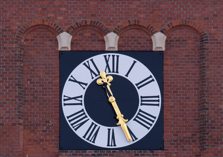 The clock on the tower of the Franciscan Church of St Mary Mother of Mercy in Maribor, Slovenia