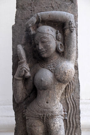 Darpanika, from 14th century found in Khondalite Puri, Odisha now exposed in the Indian Museum in Kolkata, West Bengal, Indiaのeditorial素材