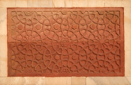 Stone pattern on a temple wall in Red Fort, Agra, UNESCO World heritage site, Indiaのeditorial素材