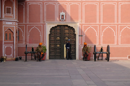 Guard and cannons in Jaipur City Palace, a palace complex in Jaipur, Rajasthan, India. It was the seat of the Maharaja of Jaipur, the head of the Kachwaha Rajput clan.のeditorial素材