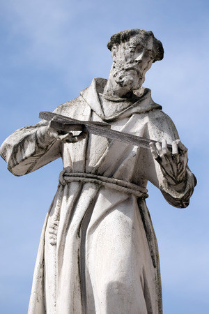 Saint Francis of Assissi statue, Plague column at Main Square of the city of Maribor in Sloveniaの写真素材