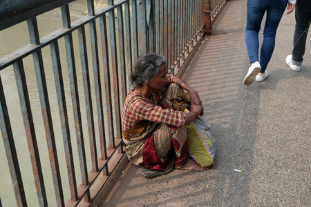 Beggars are the most disadvantaged castes living in the streets, 42% of India falls below the international poverty line of $1.25 a day. Kolkata, India on February 10, 2016.のeditorial素材