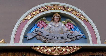 Angel with Gloria in excelsis Deo Banner, Nativity Scene, altarpiece in the church of Saint Matthew...