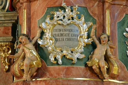 Angels, statue on the pulpit in the Parish Church of the Holy Cross in Zacretje, Croatiaのeditorial素材