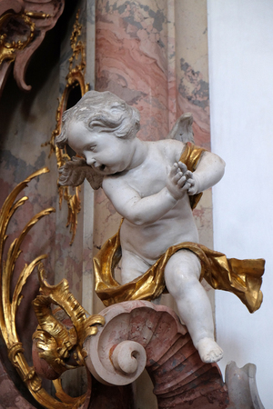 Angel statue in Amorbach Benedictine monastery church in the district of Miltenberg in Lower Franconia in Bavaria, Germanyのeditorial素材