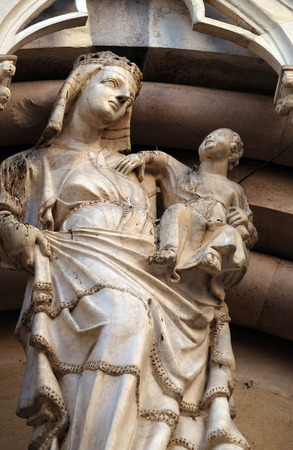 Virgin Mary with baby Jesus and Saints, portal of Saint Michele in Borgo church in Pisa, Italyのeditorial素材