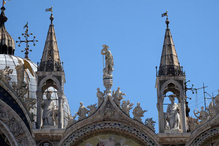 Statue of Saint, detail of the facade of the Saint Mark's Basilica, St. Mark's Square, Venice, Italyのeditorial素材