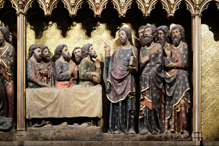 Intricately carved and painted frieze inside Notre Dame Cathedral depicting Appearance to the Apostles in Ascension Day, UNESCO World Heritage Site in Paris, Franceのeditorial素材
