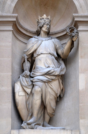 Saint Louis with Crown of Thorns, statue on the portal of the Cathedral of Saint-Louis des Invalides, Paris, Franceのeditorial素材