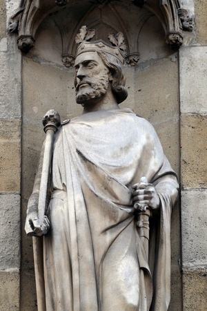 Saint Clovis, the first king of the Franks, statue on the portal of the Basilica of Saint Clotilde in Paris, Franceのeditorial素材