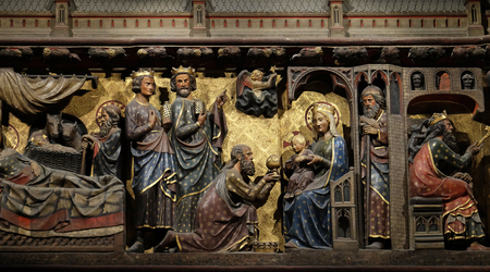 Intricately carved and painted frieze inside Notre Dame Cathedral depicting Adoration of the Magi,...