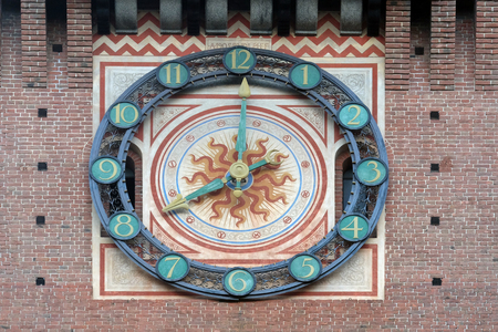 Clock on the Sforza Castle in Milano, Italy, built in the 15th century by Francesco Sforza, Duke of Milan, on the remnants of a 14th-century fortificationのeditorial素材