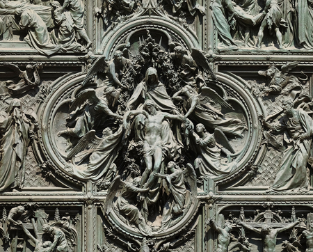 Lamentation of Christ, detail of the main bronze door of the Milan Cathedral, Duomo di Santa Maria Nascente, Milan, Lombardy, Italyのeditorial素材