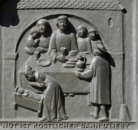 Zwingli and his family, relief on the door of the Grossmunster church in Zurich, Switzerlandのeditorial素材