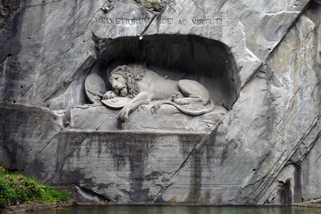 The Lion Monument or the Lion of Lucerne, designed by Bertel Thorvaldsen is a rock relief in Lucerne, Switzerlandのeditorial素材
