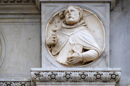 Saint, relief on the portal of the Cathedral of Saint Lawrence in Lugano, Switzerlandのeditorial素材