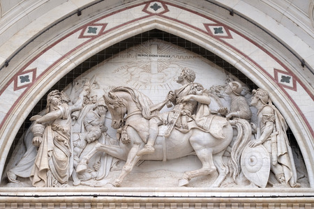 Sculpted lunette containing a scene depicting the Vision of Constantine, by Emilio Zocchi, over the right door of Basilica of Santa Croce (Basilica of the Holy Cross) - famous Franciscan church in Florence, Italyのeditorial素材