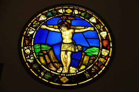 Crucifixion, stained glass window by Alesso Baldovinetti (1425â1499) in the Basilica di Santa Croce (Basilica of the Holy Cross) - famous Franciscan church in Florence, Italyのeditorial素材