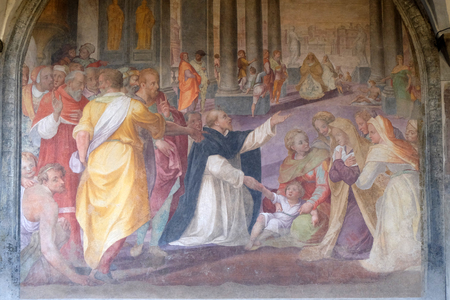 San Dominic resurrects a child, fresco by Giovanni Maria Butteri in the cloister of Santa Maria Novella Principal Dominican church in Florence, Italyのeditorial素材