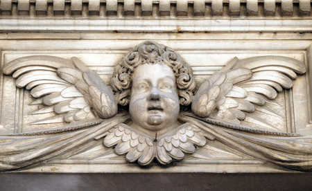 Angel on the portal of Santa Maria Corteorlandini church in Lucca, Tuscany, Italyの写真素材
