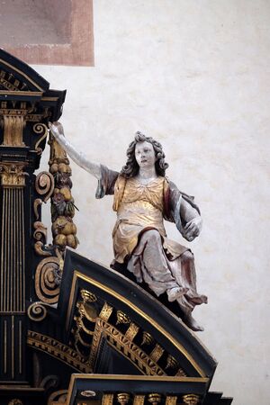 Angel, statue on the altar of the Holy Cross in Cistercian Abbey of Bronnbach in Reicholzheim near Wertheim, Germanyの写真素材