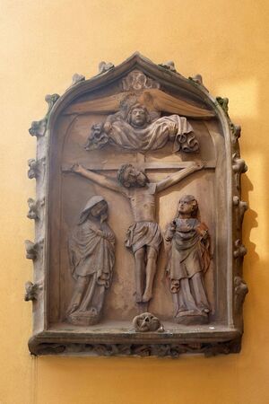 Crucifixion, relief on the house facade in Rothenburg ob der Tauber, Germanyのeditorial素材