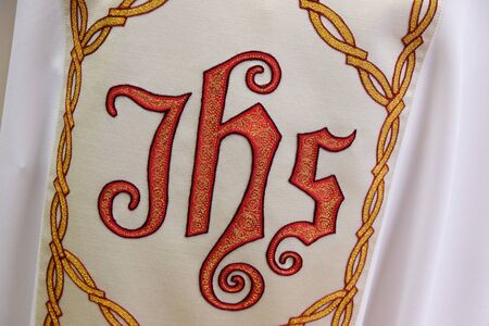 IHS sign, detail of church vestment made by the Sisters of Charity of Saint Vincent de Paul in Zagrebの写真素材