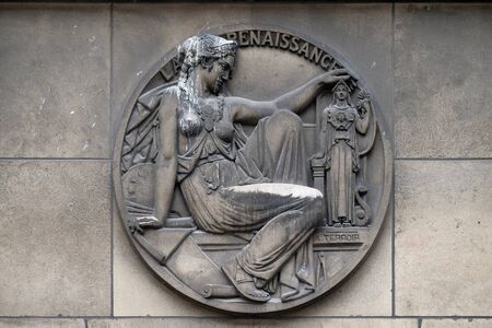 Stone relief with the Renaissance symbol at the building of the Faculte de Medicine Paris, France.の写真素材