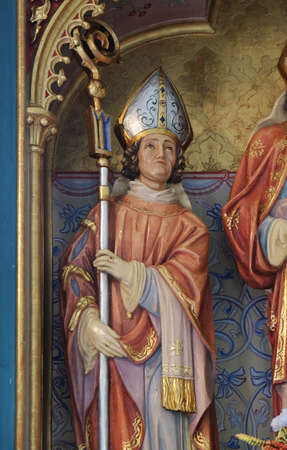 Saint Martin, statue on the main altar in the Saint Nicholas church in Petschied near Luson, Italyのeditorial素材
