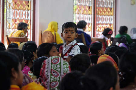 Children at Mass at Our Lady of Lourdes Church in Kumrokhali, West Bengal, India