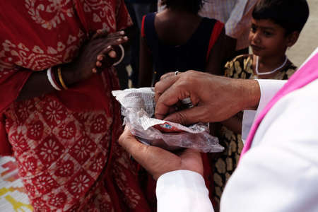Ash wednesday celebration in Mitrapur village, West Bengal, India