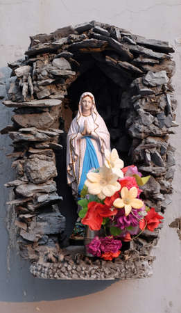Statue of Our Lady of Lourdes at Shishu Bhavan, one of the houses established by Mother Teresa and run by the Missionaries of Charity in Kolkata, Indiaのeditorial素材