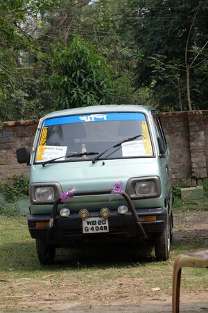 A van for transporting children to school in Kumrokhali, West Bengal, India
