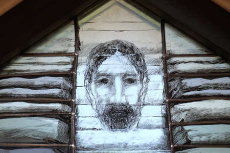 God leads his own to completion in all his glory, detail of stained glass window by Sieger Koder in church of Saint John in Piflas, Germanyのeditorial素材