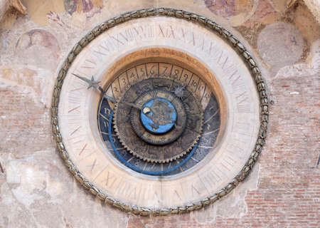 Clock tower of Palace of Reason (Palazzo della Ragione with the Torre dell'Orologio) in Mantua,...