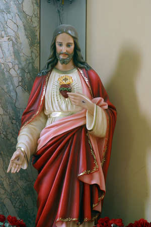 Sacred Heart of Jesus, statue in the Parish Church of the Holy Name of Mary in Kamanje, Croatiaのeditorial素材