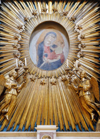Virgin Mary with baby Jesus, altar in Basilica of San Frediano, Lucca, Tuscany, Italyのeditorial素材