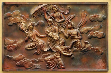 Janmakalyanaka: Birth celebration of Indra carrying Bhagavan to Mount Meru(Incident-2), Street bas relief on the wall of Jain Temple (also called Parshwanath Temple) in Kolkata, West Bengal, Indiaのeditorial素材