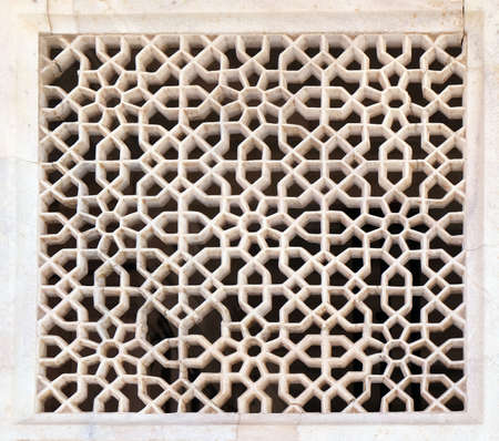 Beautiful stone carvings on the wall in Fatehpur Sikri complex, Uttar Pradesh, India