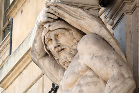 Statue of Hercules at the entrance to the 18th century Palazzo Vescovile (Bishops Palace) in the...