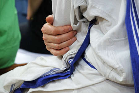 Hands of the Missionaries of Charity nun, Mother house in Kolkata, Indiaの写真素材